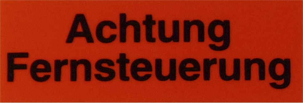 Klebeschild (Achtung Fern-